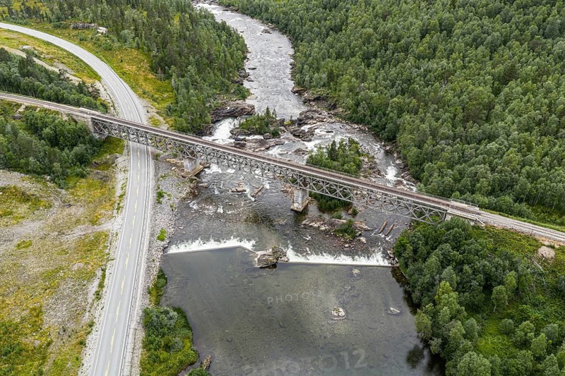 Raufjellfossen railway bridge, Nordland railway (Nordlandsbanen), waterfall at Ranelva river, near Mo i Rana, aerial view, Norway