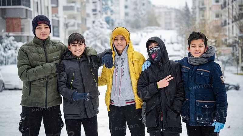 In Gaziantep, Turkey, on December 31, 2025, children and families enjoy winter activities as they play on snow-covered areas and slide on icy hills, creating a lively atmosphere across the city during the final day of the year, Gaziantep, Gaziantep, Turkey