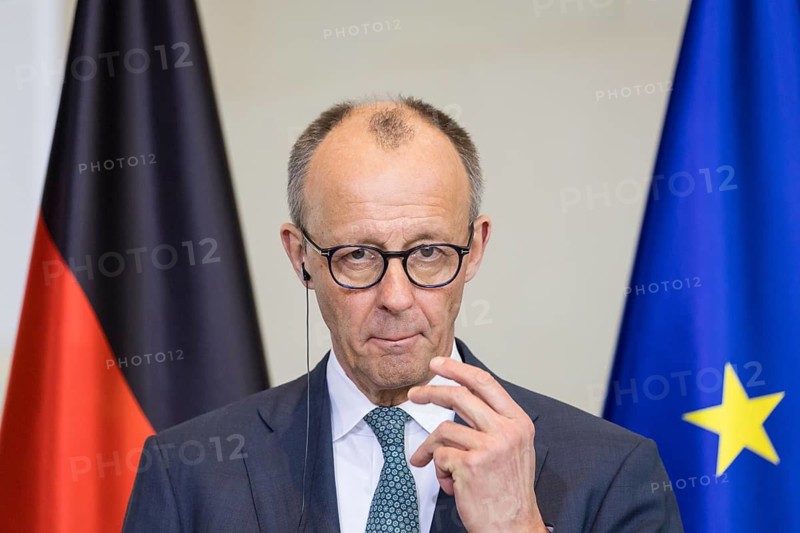 Friedrich Merz (Chancellor of the Federal Republic of Germany, CDU) at a joint press conference with Ahmed al-Sharaa (President of the Syrian Arab Republic) after a one-on-one meeting at the Federal Chancellery, Berlin, 30 March 2026
