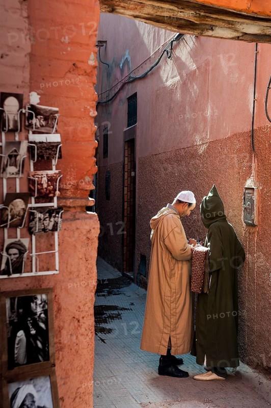 Moroccan, men, Islam, Muslim, local, traditional costume, trade in the medina of Marrakech, Morocco