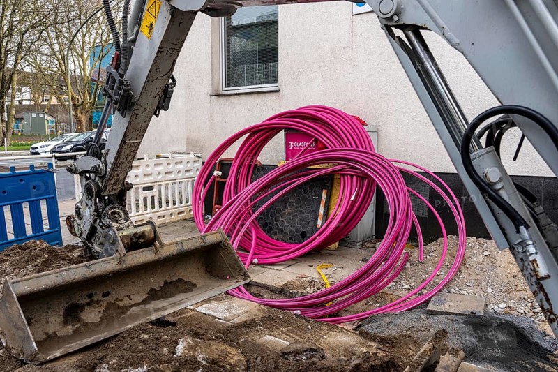 Construction site for the fibre-optic network Telekom expansion, construction work, on Alfredstraße in Essen-Rüttenscheid, North Rhine-Westphalia, Germany