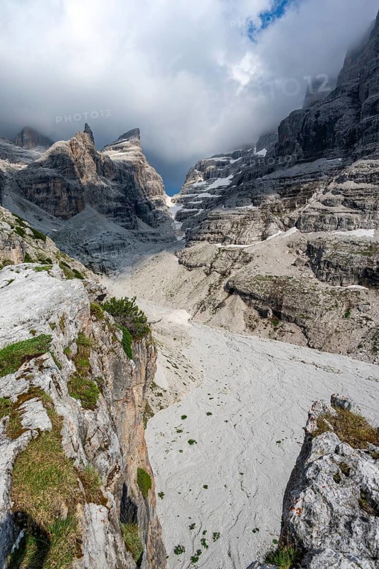 Mountain valley, Castelletto Superiore and Cima Sella peaks, back Scharte Bocca di Tuckett, dramatic atmosphere in the Brenta Mountains, Brenta, Brenta-Adamello Natural Park, Trentino, Italy