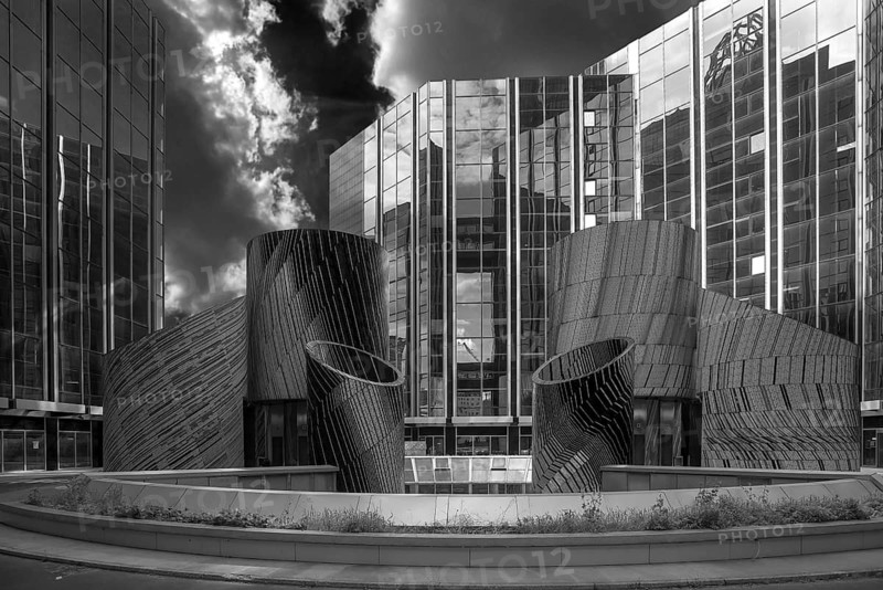 Artwork the mosaic by artist Michel Deverne in front of high-rise office buildings, La Défence, largest office building district in Europe, black and white, Paris, France