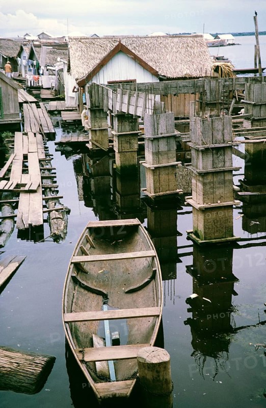 Informal housing built on logs, known as the floating city, Manaus, Brazil 1962, which was removed as part of the slum clearance policy in the late 1960s