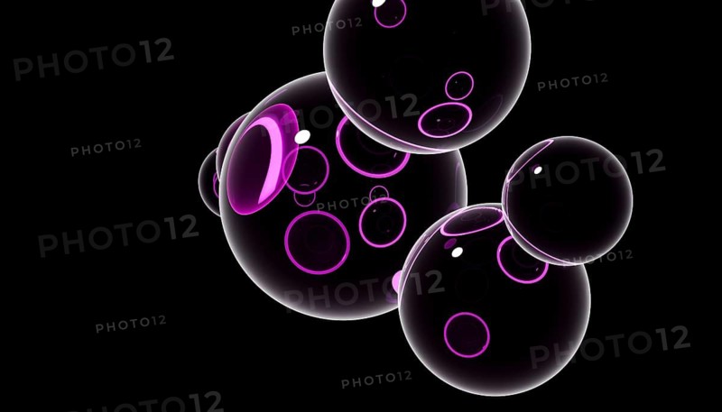 A 3D render featuring multiple black spheres with purple glowing highlights against a dark background, showcasing a modern and abstract design