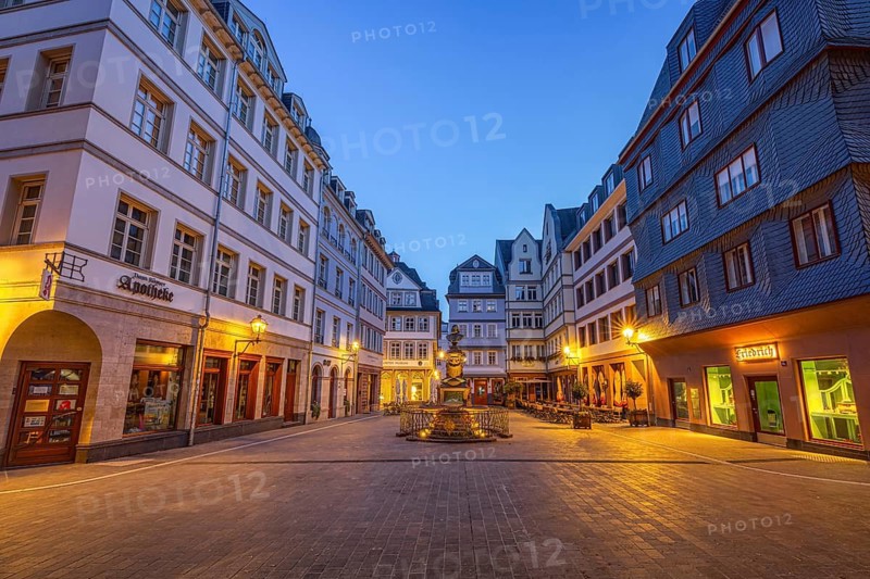 The lights of the street lamps and some shops are on in the morning at the chicken market in the New Old Town of Frankfurt am Main, Frankfurt am Main, Hesse, Germany
