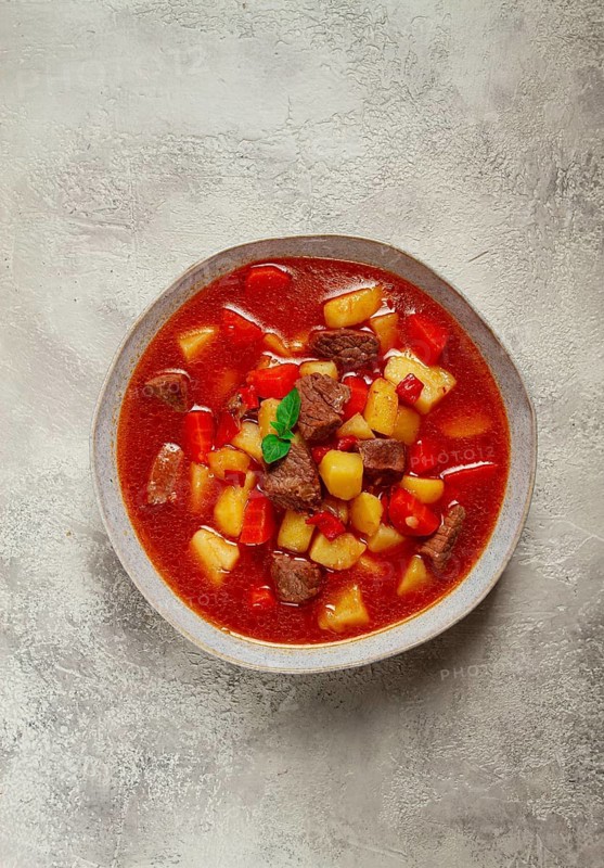 Meat goulash, with potatoes and carrots, sweet pepper, traditional Hungarian soup, homemade, no people