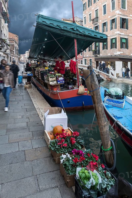 Selling fruit and vegetables from a boat, Venice, Veneto, Italy