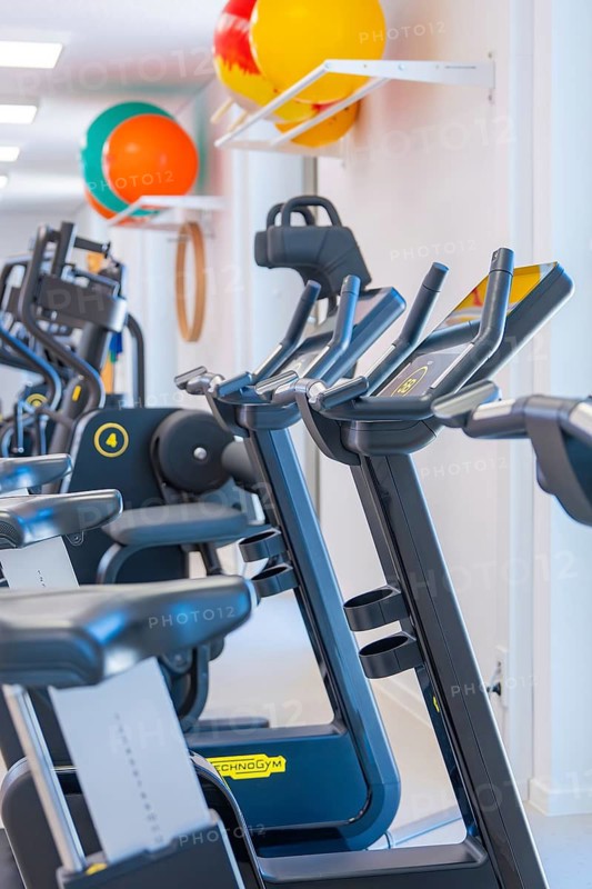 Modern treadmills in the gym with colorful balls on the walls, medical center in the new health campus, Calw, Germany