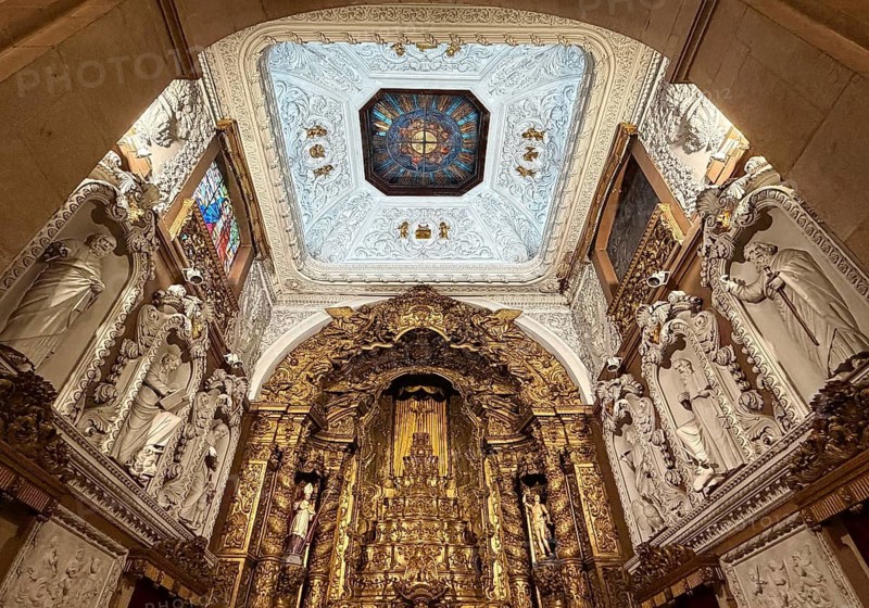 Igreja Paroquial de Santo Ildefonso, interior with altar and view of the ceiling of the Catholic church built in the 18th century, Porto, Portugal