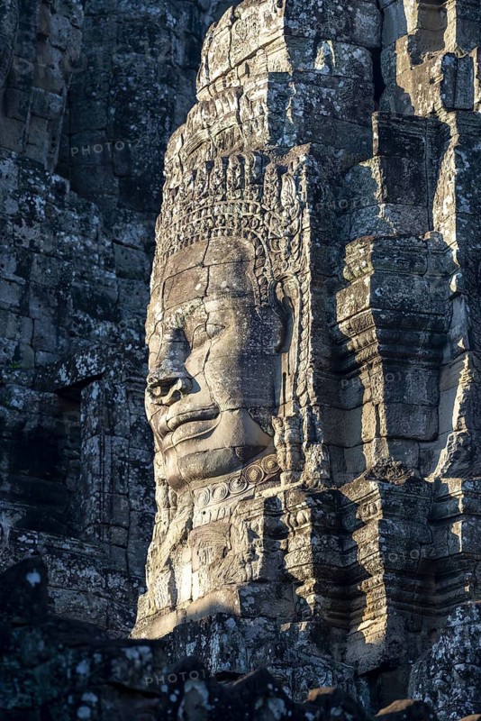Giant stone-carved face of the Bodhisattva Lokeshvara, also known as Avalokiteshvara, Bayon Temple, Angkor Thom, UNESCO World Heritage Site, Angkor Wat, Siem Reap, Cambodia