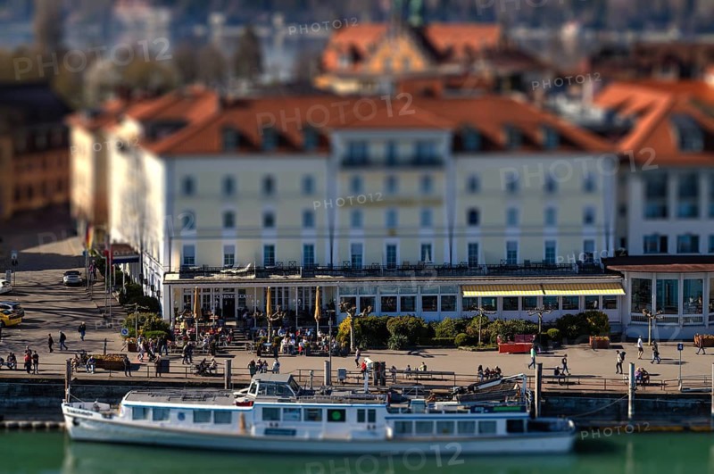 View from New Lighthouse to Hotel Bayerischer Hof, Bodenseeferry, Friedrichshafen passenger ship of the BSB, Lake Constance-Schifffahrt, Lake Constance Schiffsbetriebe GmbH, old town, thumbnail view, toy view, tilt-shift effect, Lindau, Bavaria, Lake Constance, Germany
