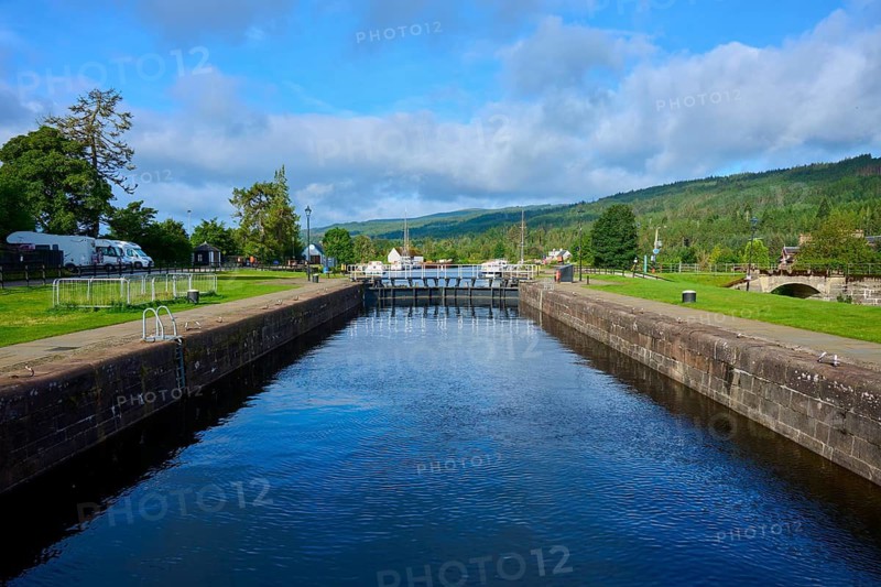 A long stretch of canal with lock in quiet rural surroundings, Caledonian Canal, Fort Augustus, Loch Ness, Scotland, United Kingdom, Great Britain