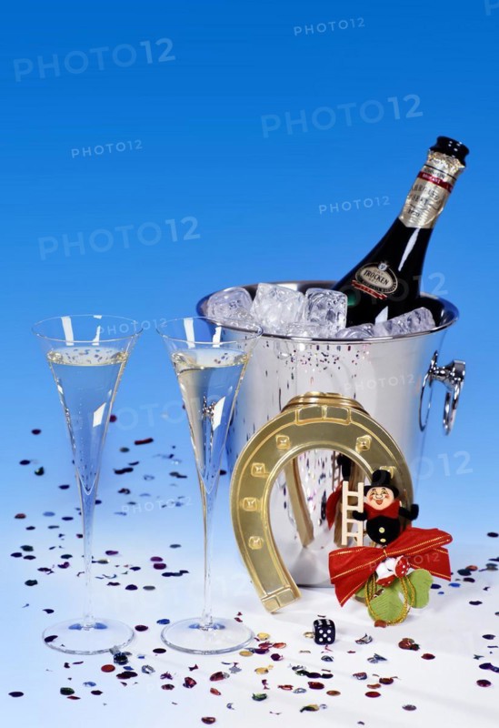 New Year's Eve decorations, champagne and lucky charms for New Year's Eve