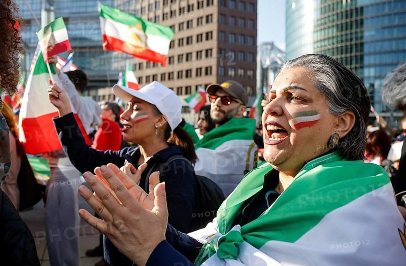 Iranians demonstrate on the day of the US and Israeli attack on Iran in Berlin, 28.02.2026. People cheer the rumor that Obermullah Khamenei died in the attack, Berlin, Berlin, Germany