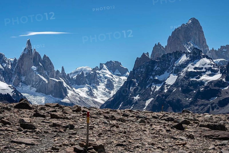 Trail to viewpoint Loma del Pliegue Tumbado, mountain range of Cerro Torre and Cerro Fitz Roy in the back, El Chalten, Argentina