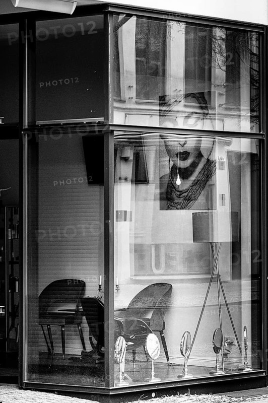 Black and white photograph, view through the window of a cosmetics shop, Berin, Germany