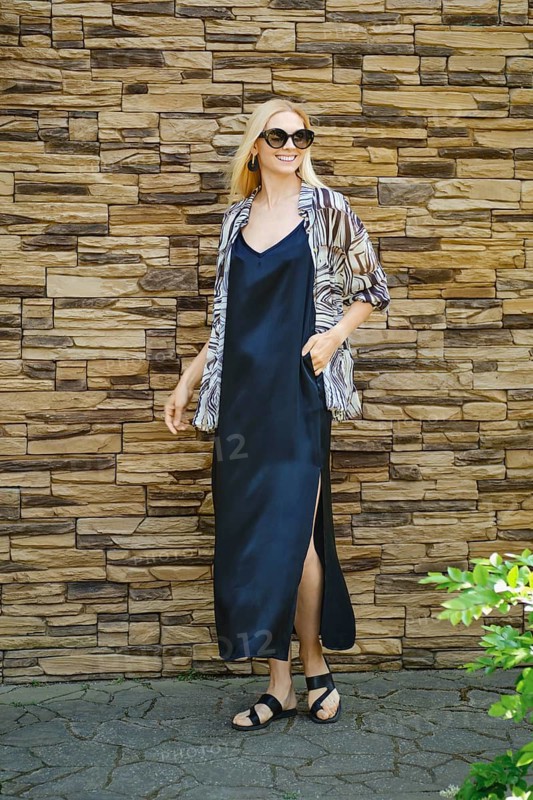 Summer fashionable woman In spaghetti strap long dress and shirt