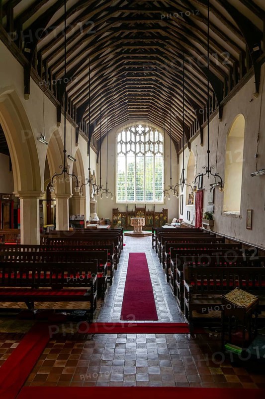 View of nave to west window, church of Saint Mary and Saint Peter, Kelsale, Suffolk, England, UK