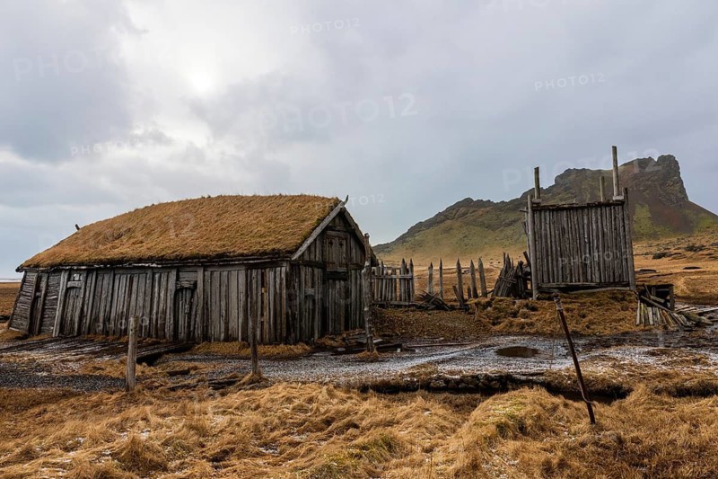 Wickinger buildings against mountain backdrop, winter, Stokksnes, Vestrahorn, Klifatindur, Höfn, Iceland, Scandinavia