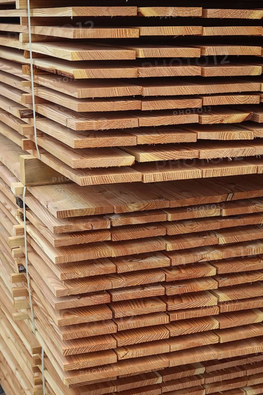 Solingen, North Rhine-Westphalia, Germany - Larch logs are processed into construction timber, construction timber is scarce and expensive, carpentry and joinery companies are struggling with rapidly rising raw timber prices in times of the corona crisis, and large quantities of logs are exported to China and the USA