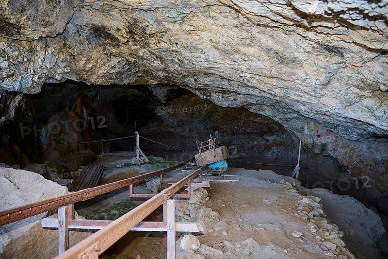 Passageway in a shady cave with walkways and excavation tools, museum, Charkadio Cave, dwarf elephant (Palaeolodoxon tiliensis), Elephas Tiliensis, Megalo Chorio, Zero Waste Island, Tilos, Dodecanese, Greek Islands, Greece