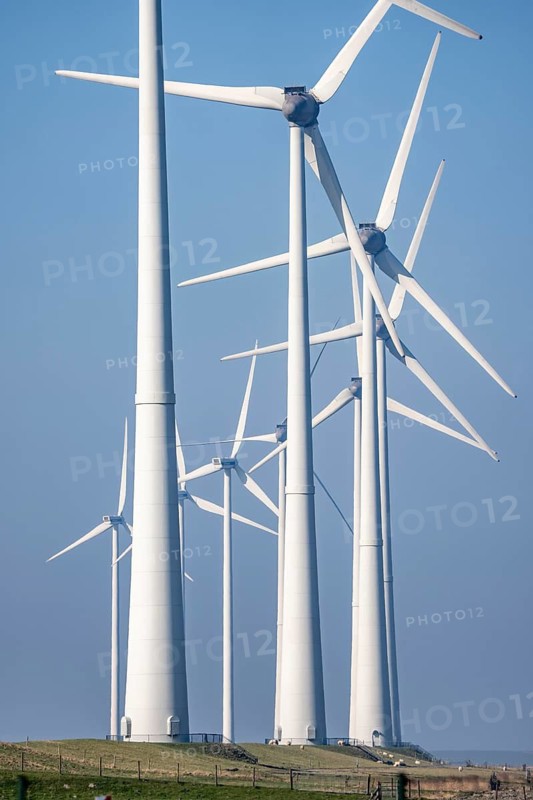 Wind farm in the north of the Netherlands, near Eemshaven, energy center, in addition to wind energy, there are coal and gas power plants and various energy infrastructure facilities here, Netherlands