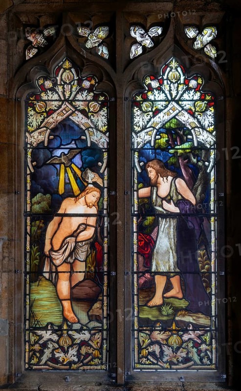 Baptism of Christ stained glass window church of Saint John the Baptist, Peterborough, Cambridgeshire, England, UK