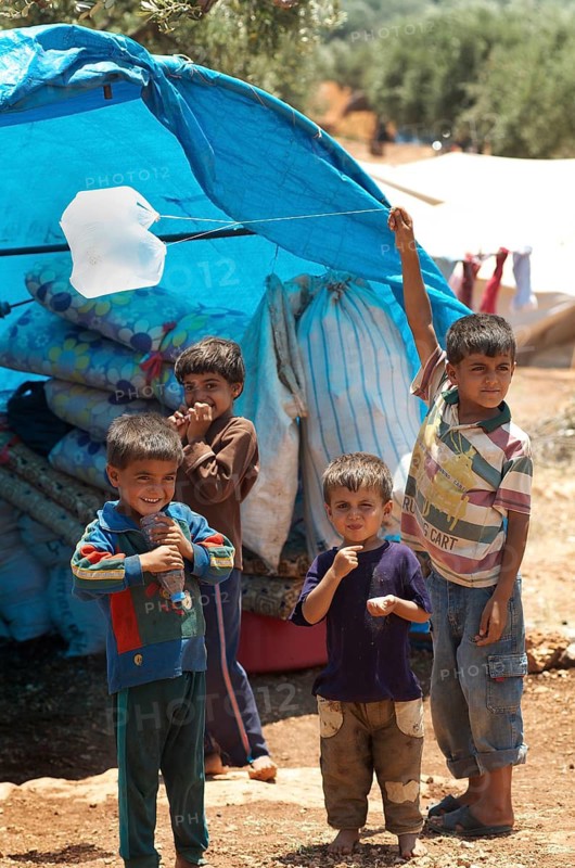 Atmeh Refugee Camp, Idlib, Syria. June 17th 2013. Internally displaced child Syrian refugees in the Atmeh refugee camp, Idlib province Syria