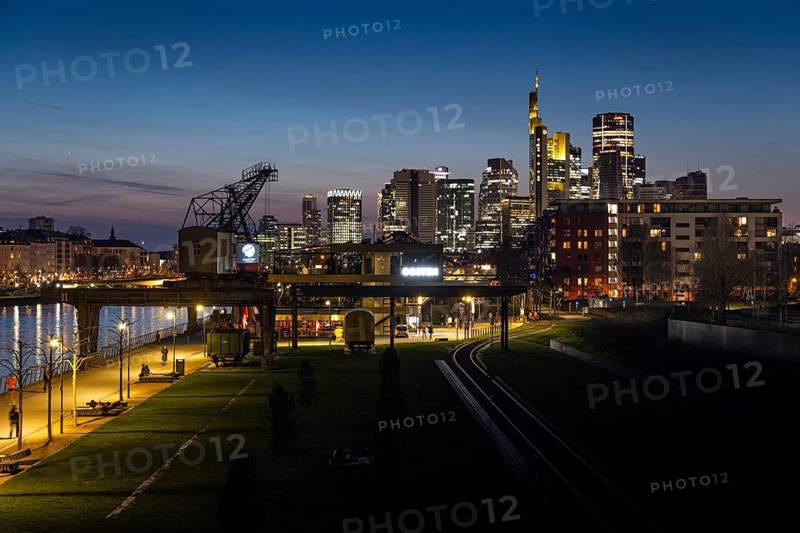 The lights of Frankfurt's banking skyline glow in the evening, Frankfurt am Main, Hesse, Germany