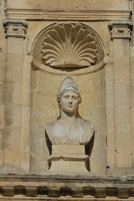 Stone sculpture and bust with shell, Ste-Anne church, Place de la République, Episcopal Palace, Place de la République, Kaiserplatz, Arles, Bouches-du-Rhône, Camargue, Provence, France