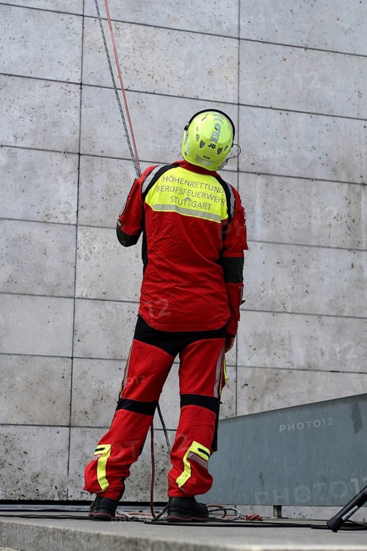 Men of the Stuttgart Fire Brigade at the presentation of the new design, design language of the Stuttgart Fire Brigade, professional fire brigade, from behind, Marktplatz, Stuttgart, Baden-Württemberg, Germany