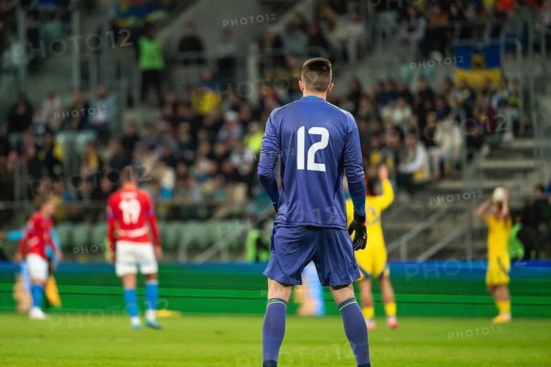 Goalkeeper's back during soccer match