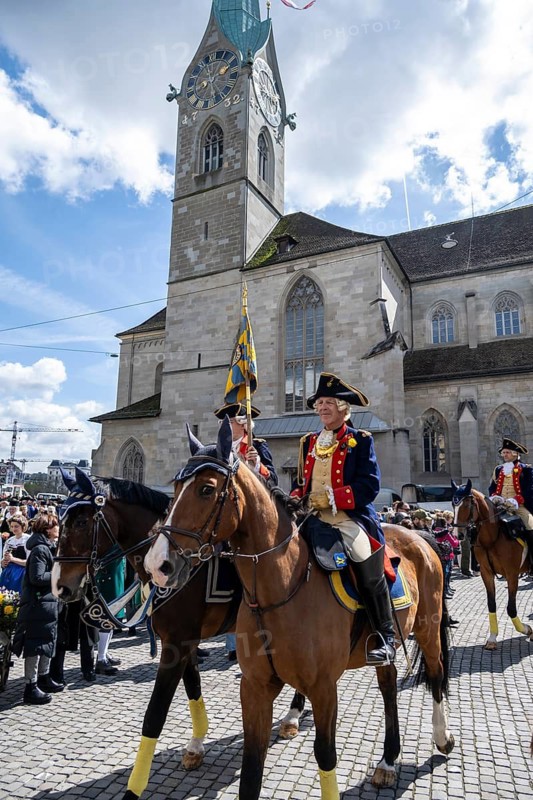 Historically costumed guild members in Zurich's old town, riders in front of the Fraumünster church, Zunft zur Meisen, Sechseläuten or Sächsilüüte, Zurich Spring Festival, Zurich