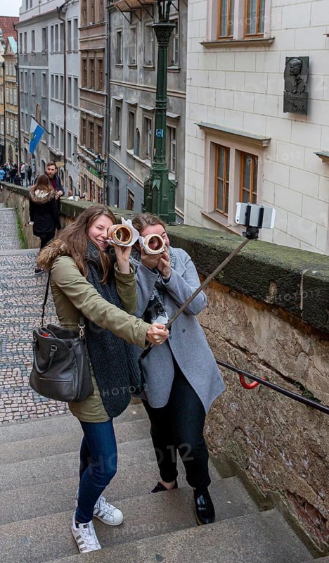 Tourists in a small alley, Old Town of Prague, Czech Republic
