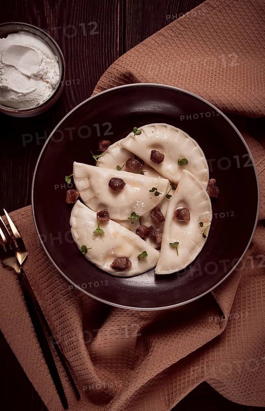 Pierogi, a traditional dish of Polish cuisine, dumplings, top view, close-up, no people