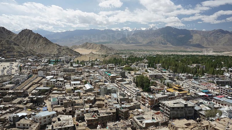 City view from Leh Palace over Leh with mountains and cloudy sky, Ladakh, North India, Himalayas, India