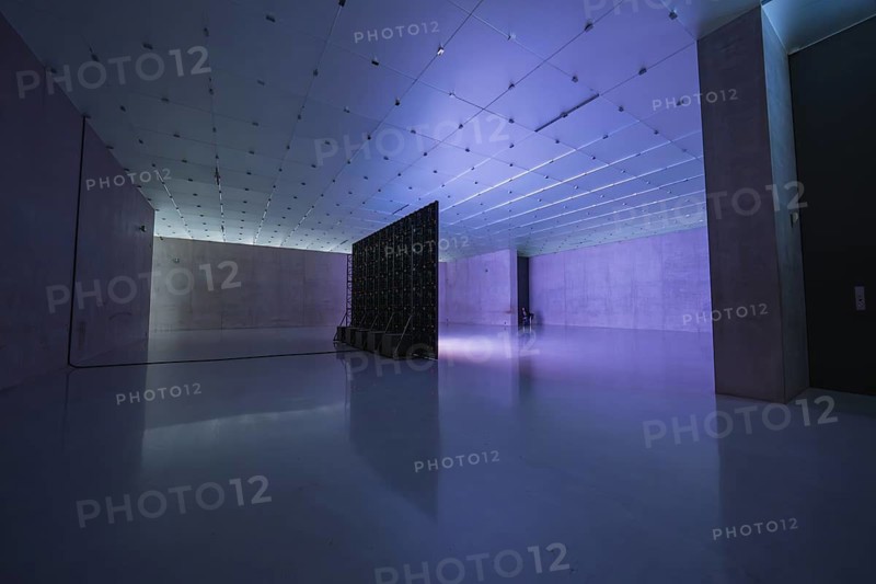 Modern room with shades of blue and purple, empty and industrial, with light installation, Kunsthaus Bregenz, Vorarlberg, Austria