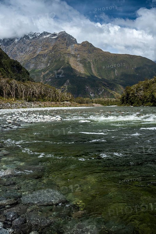 Landscape on Milford Sound with river and mountains. Cleddau River, Milford Sound, Fiordland National Park, Southland Region, South Island, New Zealand