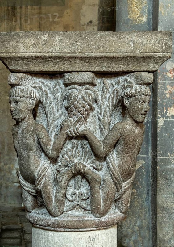 Mozac. The atlantes. Sculptures of Saint-Pierre Abbey Church. Puy de Dome department. Auvergne-Rhone-Alpes. France
