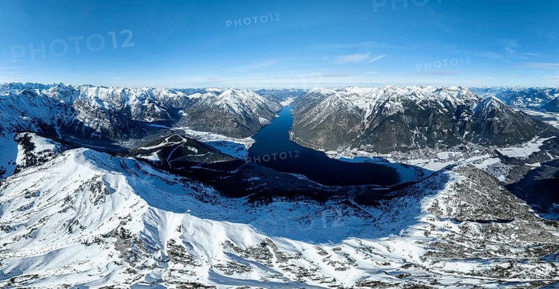 Aerial view, epic view of mountain landscape with snow in winter, summit of Bärenkopf, Achensee, Tyrol, Austria