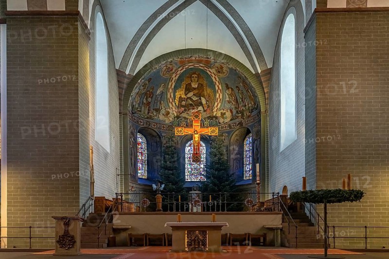 Apse and altar cross in the interior of St. Patrokli Cathedral in Soest, North Rhine-Westphalia, Germany