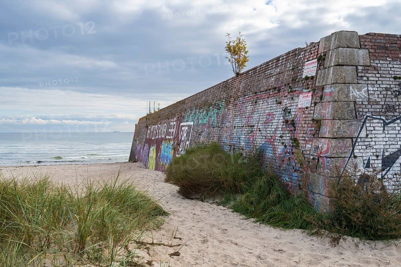 Old harbor wall on the beach near Prora, dark clouds in the sky, Binz, Rügen, island, Baltic Sea, Mecklenburg-Western Pomerania, Germany