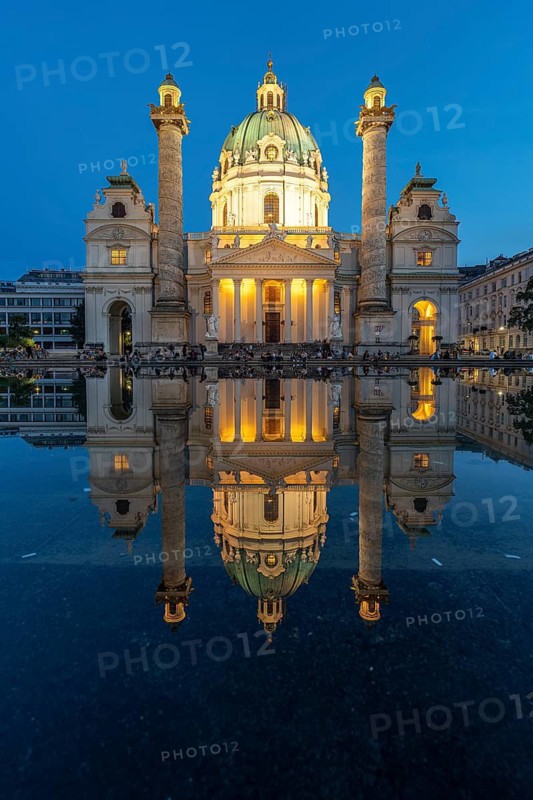 The baroque Karlskirche church at dusk, Vienna, Austria