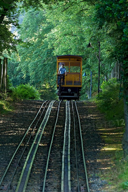Historic funicular railway, rack and pinion funicular railway with water load on tracks, Nerobergbahn from 1888 travelling in the forest, technical cultural monument, Neroberg, Wiesbaden, Hesse, Germany