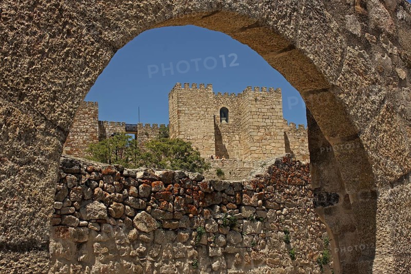 Archway and city wall with castillo in Trujillo, Extremadura, Spain