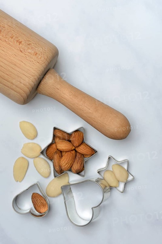 Almonds and biscuit cutters for biscuits, almond kernels