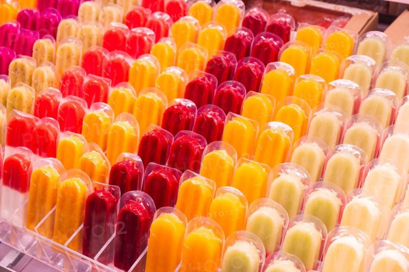 Several rows of ice lollies, Mercat de la Boqueria, famous market on the Ramblas in Barcelona, Spain