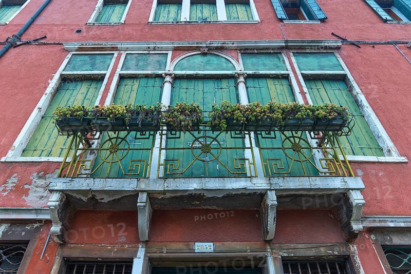 Balcony and closed shutters of an empty palace, Venice, Venice, Italy