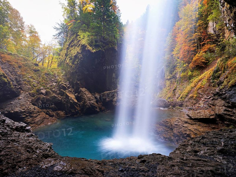 Waterfall mountain list in autumn-colored surroundings, Linthal, Klausenpass, Canton of Glarus, Switzerland